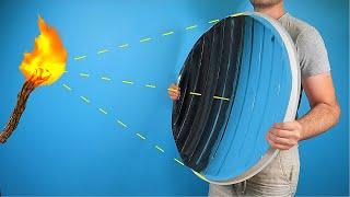 Огромное самодельное вогнутое зеркало прожигает предметы