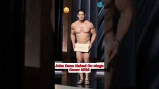 A naked John Cena and Jimmy Kimmel bicker on stage at the 2024 #oscars