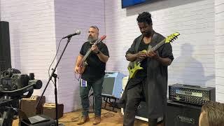 Tosin Abasi and Javier Reyes of Animals As Leaders playing The Woven Web at NAMM 2020 for Fishman