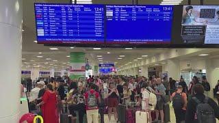 Tourists trapped at Cancun airport after Beryl swept through Yucatan Peninsula