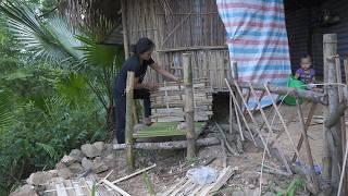 Poor single mother Catching fish in the stream - making a shelter for the poor dog