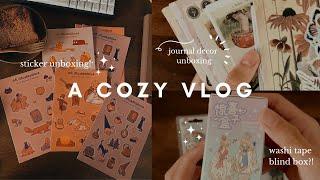 a cozy vlog  unboxing stationery stickers and books