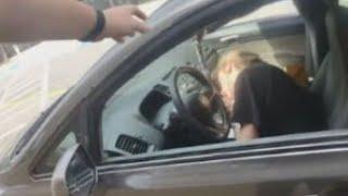 Video shows mother arrested after passing out at McDonalds drive-thru with baby in car