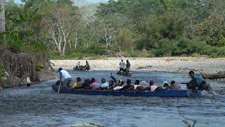 Migrants resume route through Panamas dangerous Darién jungle as borders reopen