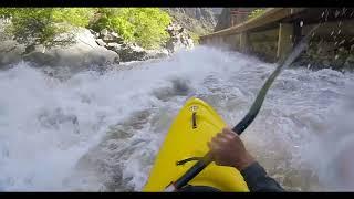 Kayaking Upper Death rapid in Glenwood Canyon