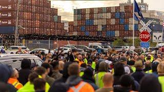 Port workers strike on both sides of the border in potentially crippling job action