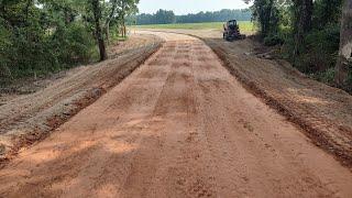 Setting The Culvert Pipe And Building Road Through The Woods