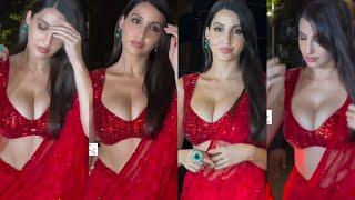 BAAP RE  NORA FATEHI looking hot in red saree as she flaunnts her huge cleavage at an event 