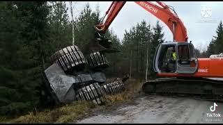 John Deere 1270G  fallen machine rescue  with excavator 
