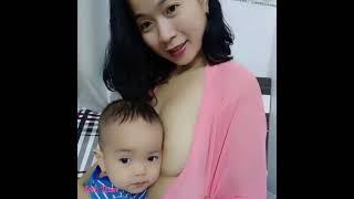 beautiful Mom Breastfeeding • single mom feeding • baby socking nipples • breastfeeding video