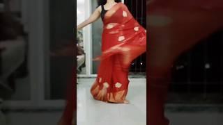 Red Sheer Georgette saree teamed up with sleeveless silk Black blouse