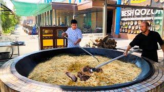 UZBEKISTAN I COOK PILAF IN THE PILAF CENTER IN TASHKENT.