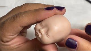 Sculpting a Micro polymer clay baby.