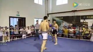 Bodybuilder Challenges Kickboxing Coach In The Ring