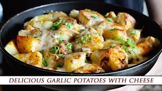 Garlic ROASTED POTATOES with MELTED CHEESE