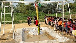 Sliding into fun or climbing to victory ?? Slippery challenge of scaling an oily banana tree