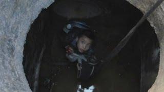 Boy rescued from sewer in China