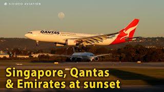 Qantas VH-EBB & Emirates A6-EEQ arrive & Singapore 9V-SCS departs Perth Airport.