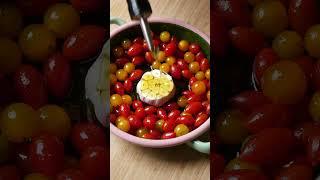 Slow roasted garlic and tomatoes with olive oil and balsamic glaze on toast with burrata