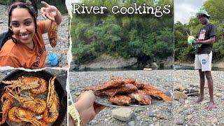 Cooking Curry lobster and fried fish with breadfruit at River in Jamaica with my broken leg 