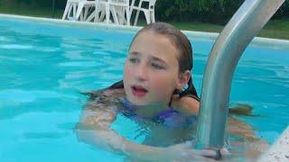 The Kids Swimming in the Pool During Our Family Vacation in New York