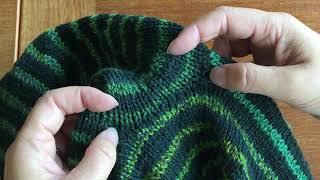 Knitting a top down sleeve from held stitches