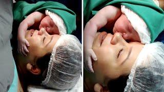 Emotional Moment Newborn Clings To Mothers Face
