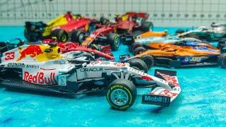 BBURAGO AND TARMAC WORKS F1 Special One Off Livery 143 and 164 Scale Diecast Model Collection