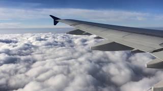 Flying over the huge clouds  Air Astana  Almaty to Delhi