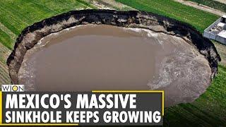 Huge sinkhole in Mexico threatens to swallow house  Mexico giant hole  Latest World English News