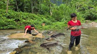 Catching fish is the childs job to earn a living. He has to feed himself and raise ducklings