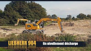 Liebherr 904 nivellement de la décharge fin...