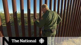 Patrolling the border wall with a U.S. border agent