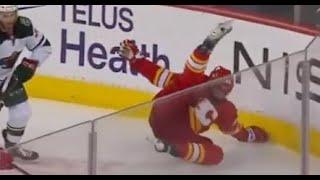 Flames Markstrom saves Oliver Kylington after big hit into the boards