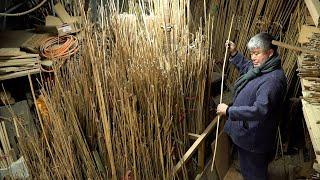 The process of making a fishing rod from solid bamboo. Korean traditional fishing rod craftsman