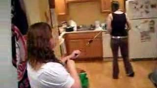 Girl takes blow dart in the ass