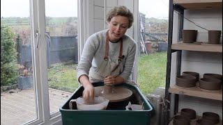 Pottery - Throwing on the Potters Wheel The Basics - Coning - How to Cone up Clay.