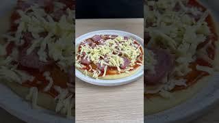 Microwave pizza that is ready in less than 7 minutes.
