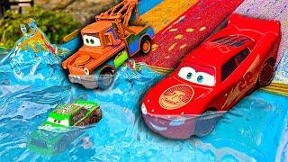 Disney Pixar Cars fall into the water Lightning McQueen Chick Hicks Mack Trucks Dinoco Mater
