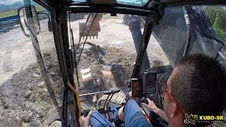 VOLVO EC300E moving stone - excavator cab view