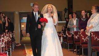 Bride surprises groom by singing down the aisle.  Groom WEEPS    One of the first singing brides