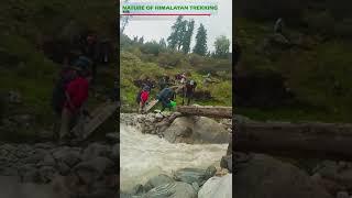 Nature of Himalayan Trekking  Adventure Crossing mountainous river  Himalayan Trekkers  Traveler