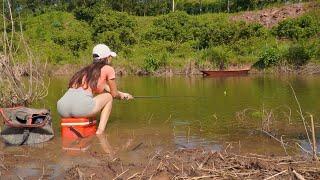 Best Video Hook Fishing. Beautiful Girl Catches a fish originating from the Amazon Forest