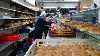 Master Bakers making 100s of bagels at World Famous 24 hour bakery Beigel Bake Brick Lane London