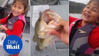 You got it CUTEST reaction when a girl catches a bass fish - Daily Mail