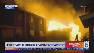 Fire tears through Hemet apartment carport