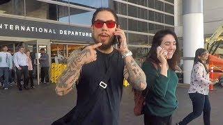 Dave Navarro And Girlfriend Have A Conference Cell Phone Chat As They Arrive In L.A.