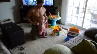 Baby takes 1st steps and fathers reaction is priceless.