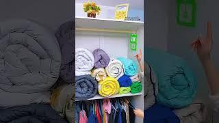 Maximize space with our Buttonhole Strap Perfect for organized closets.  #SpaceSaver