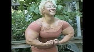 Huge muscular Female bodybuilder has some huge Arms 